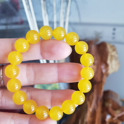 Chiếc Vòng tay đá mã não vàng anh tươi quá đẹp Size hạt 10mm Nữ mệnh kim thổ thủy đeo Vòng vàng anh này người lớn trẻ em nhỏ đeo được hết ạ rất là xinh xắn luôn