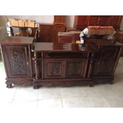 Kệ tivi gỗ tràm kệ cột nho phun pu vân mun giá thật