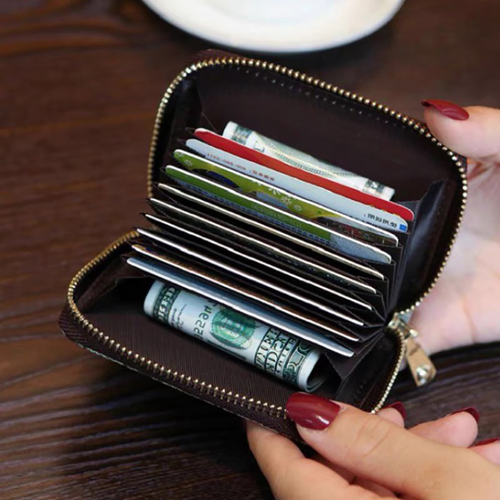 Ví da ngắn mini cầm tay nữ nhiều ngăn da PU cao cấp, chất da mềm mịn .dùng đựng thẻ , giấy tờ xe , đựng tiền nhỏ gọn và tiện lợi phong cách nữ tính, trẻ trung , hiện đại